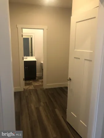 a view of interior space with wooden floor