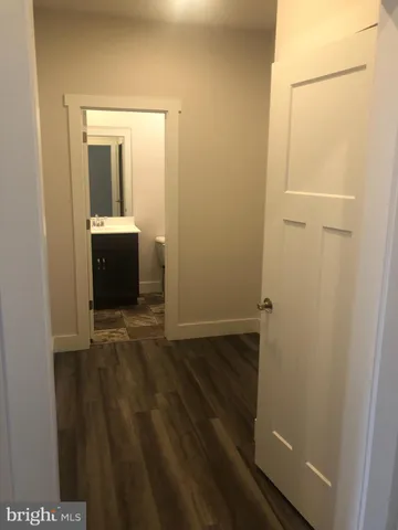 a view of interior space with wooden floor