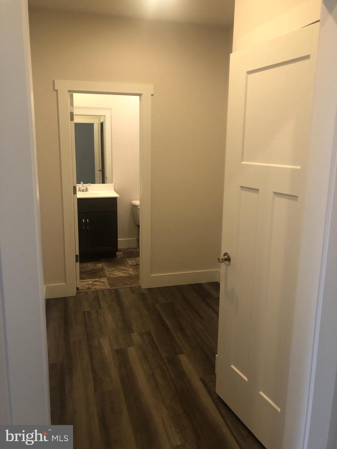 4135 Orrs Town Court, Unit 4B Mechanicsburg, PA 17050 - Photo 12 of 49 a view of a bathroom from a hallway