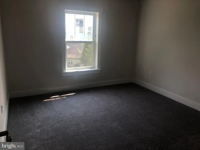a view of a hallway with closet