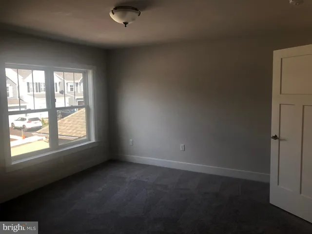 a bathroom with a toilet and a sink