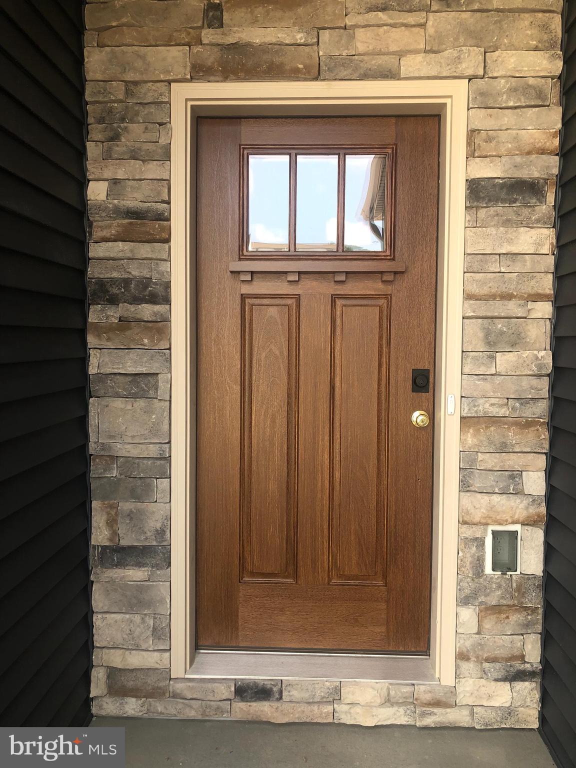 4135 Orrs Town Court, Unit 4B Mechanicsburg, PA 17050 - Photo 4 of 49 a view of wooden door