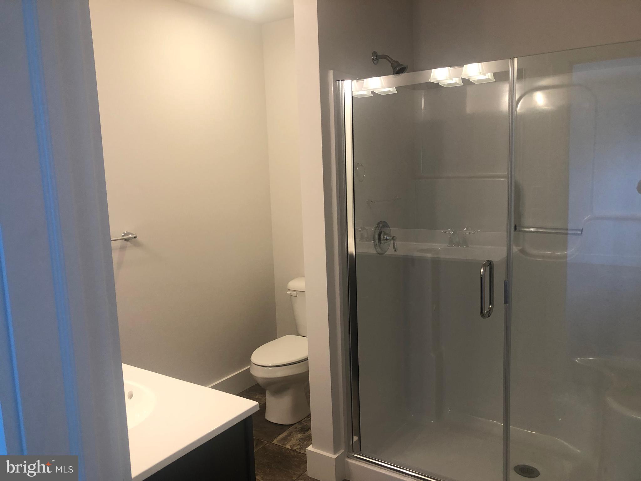 4135 Orrs Town Court, Unit 4B Mechanicsburg, PA 17050 - Photo 44 of 49 a bathroom with a shower