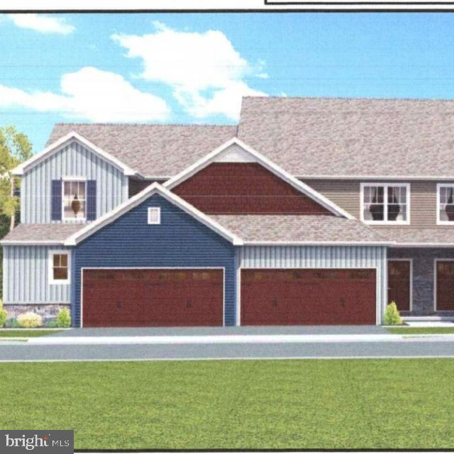4135 Orrs Town Court, Unit 4B Mechanicsburg, PA 17050 - Photo 49 of 49 a front view of a house with a yard and garage