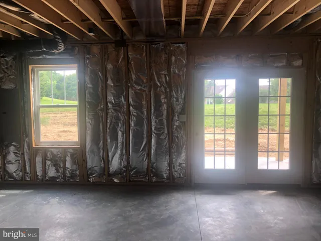 a view of a room with a large window