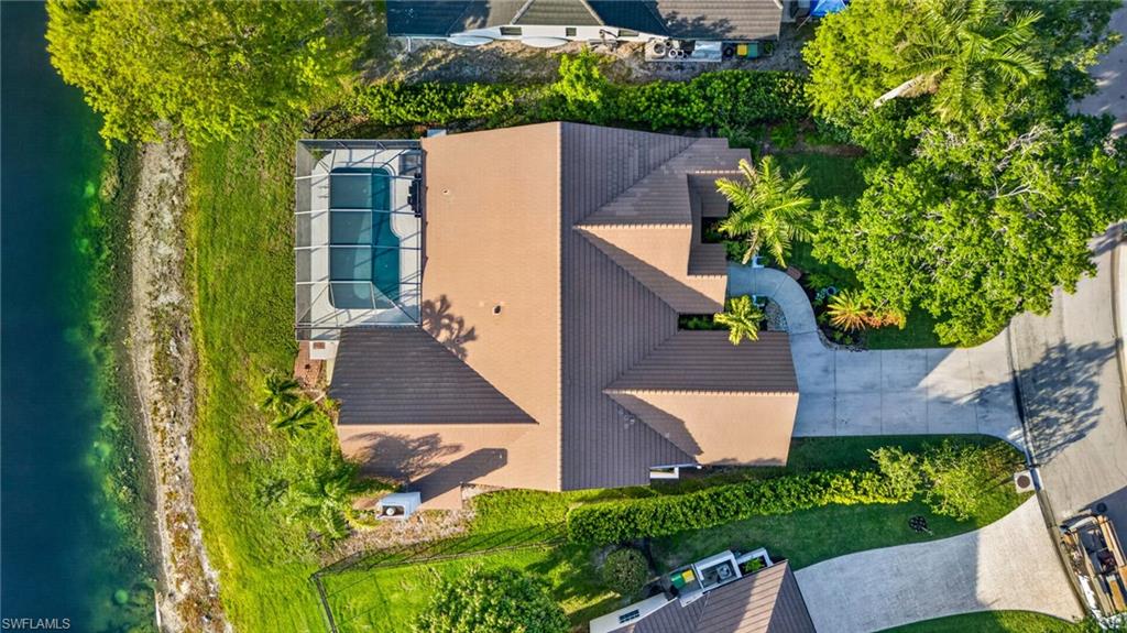 7657 Ponte Verde Way Naples, FL 34109 - Photo 36 of 41 an aerial view of a house with a yard