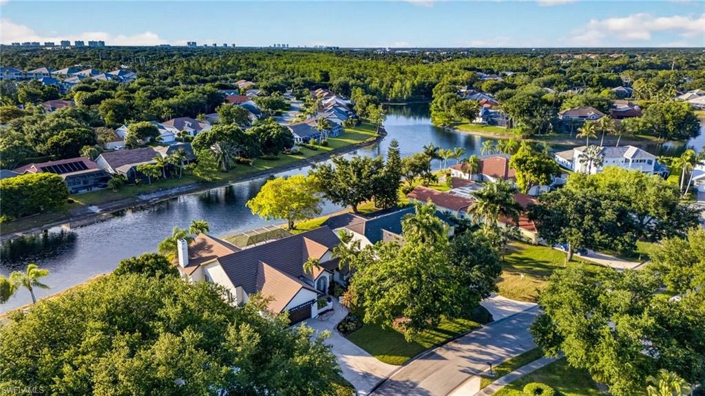 7657 Ponte Verde Way Naples, FL 34109 - Photo 40 of 41 an aerial view of a house with a yard