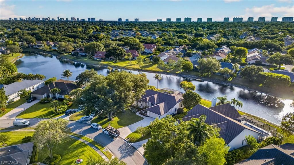 7657 Ponte Verde Way Naples, FL 34109 - Photo 41 of 41 an aerial view of residential houses with outdoor space and swimming pool