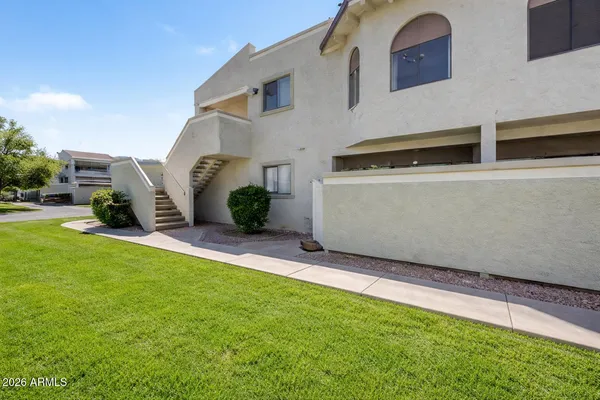 a view of a back yard of the house