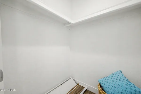 a view of a balcony with chairs