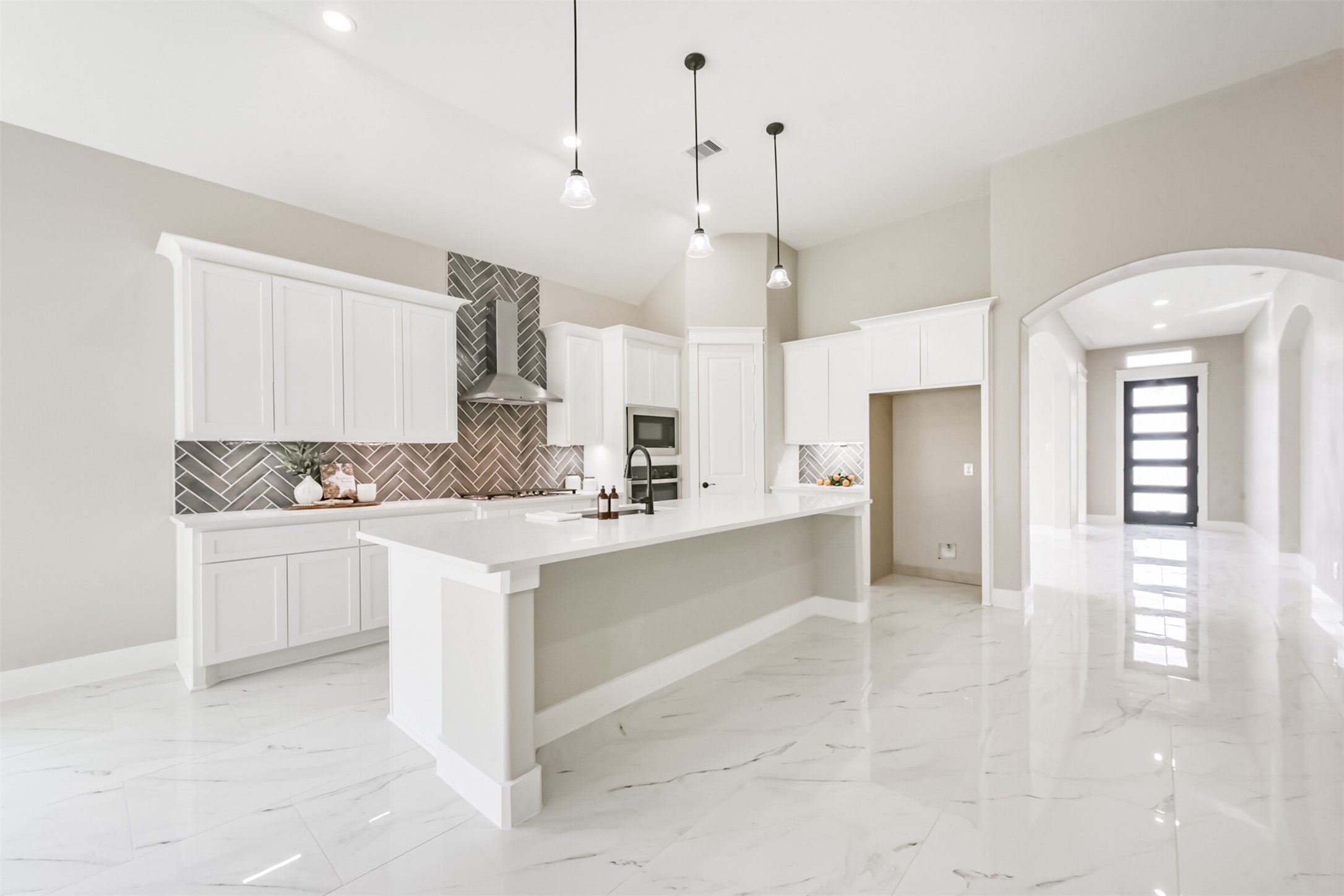 2803 Lancaster Lane Pasadena, TX 77506 - Photo 19 of 45 a large kitchen with cabinets and stainless steel appliances