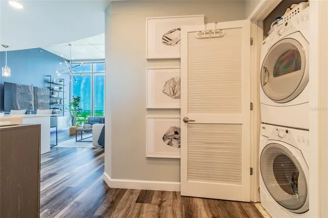 a view of a hallway with washer and dryer
