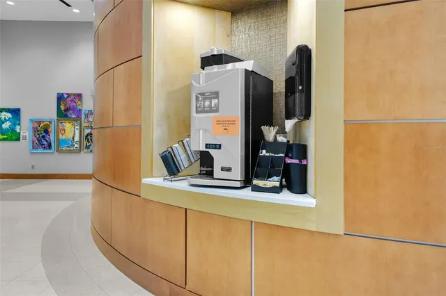 a room with refrigerator and washer