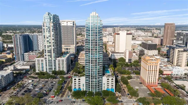 a view of a city with tall buildings