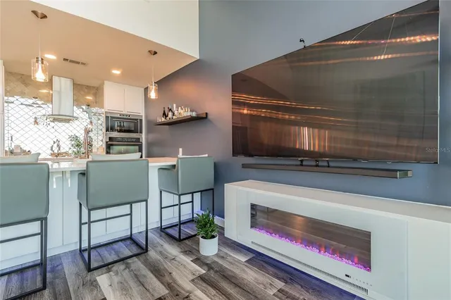 a living room with furniture and a rug