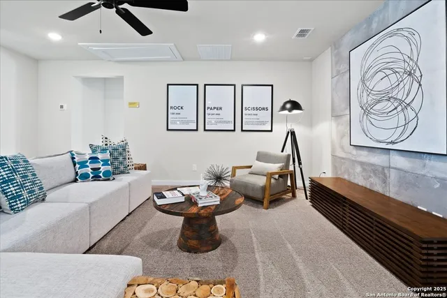 a bedroom with a bed and a cabinets