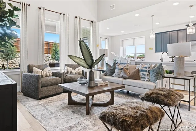 a bed room with a bed and a large window