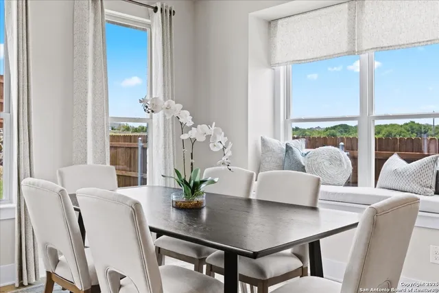 a bathroom with a double vanity sink mirror and double