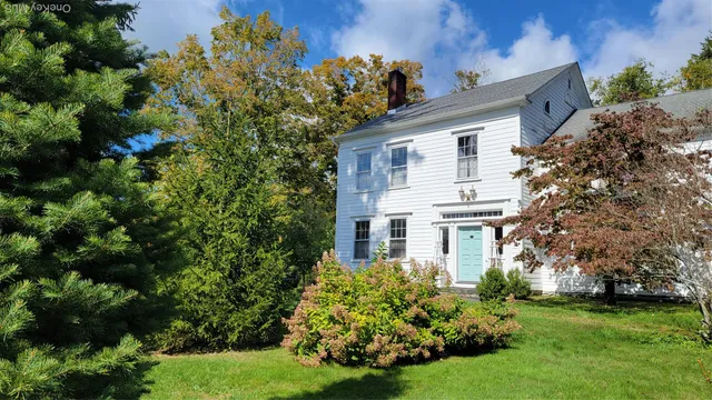 a house that has a lot of plants in it