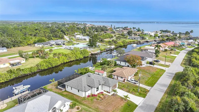 an aerial view of a house with a garden