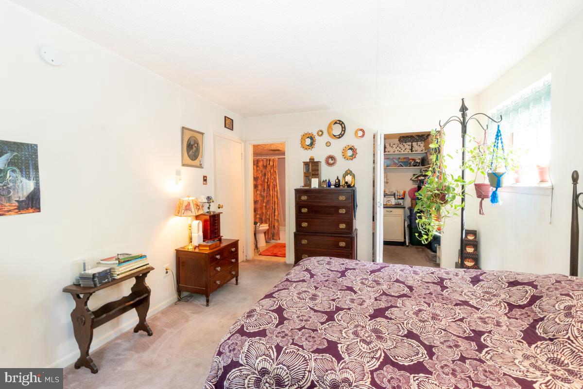 400 Glendale Road, Unit F30 Havertown, PA 19083 - Photo 13 of 23 Primary Bedroom with Walk in Closet and Full Bath