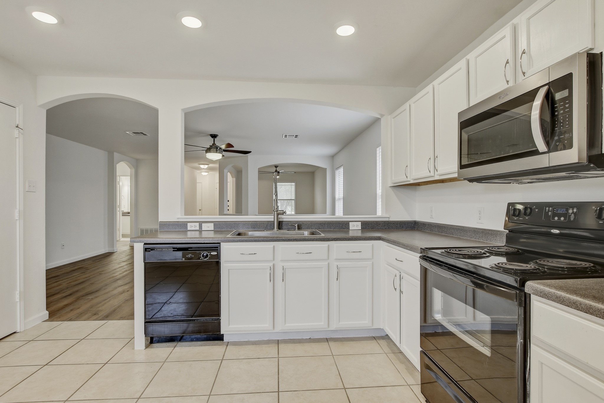 315 Northern Trail Leander, TX 78641 - Photo 15 of 30 a kitchen with a stove and a microwave