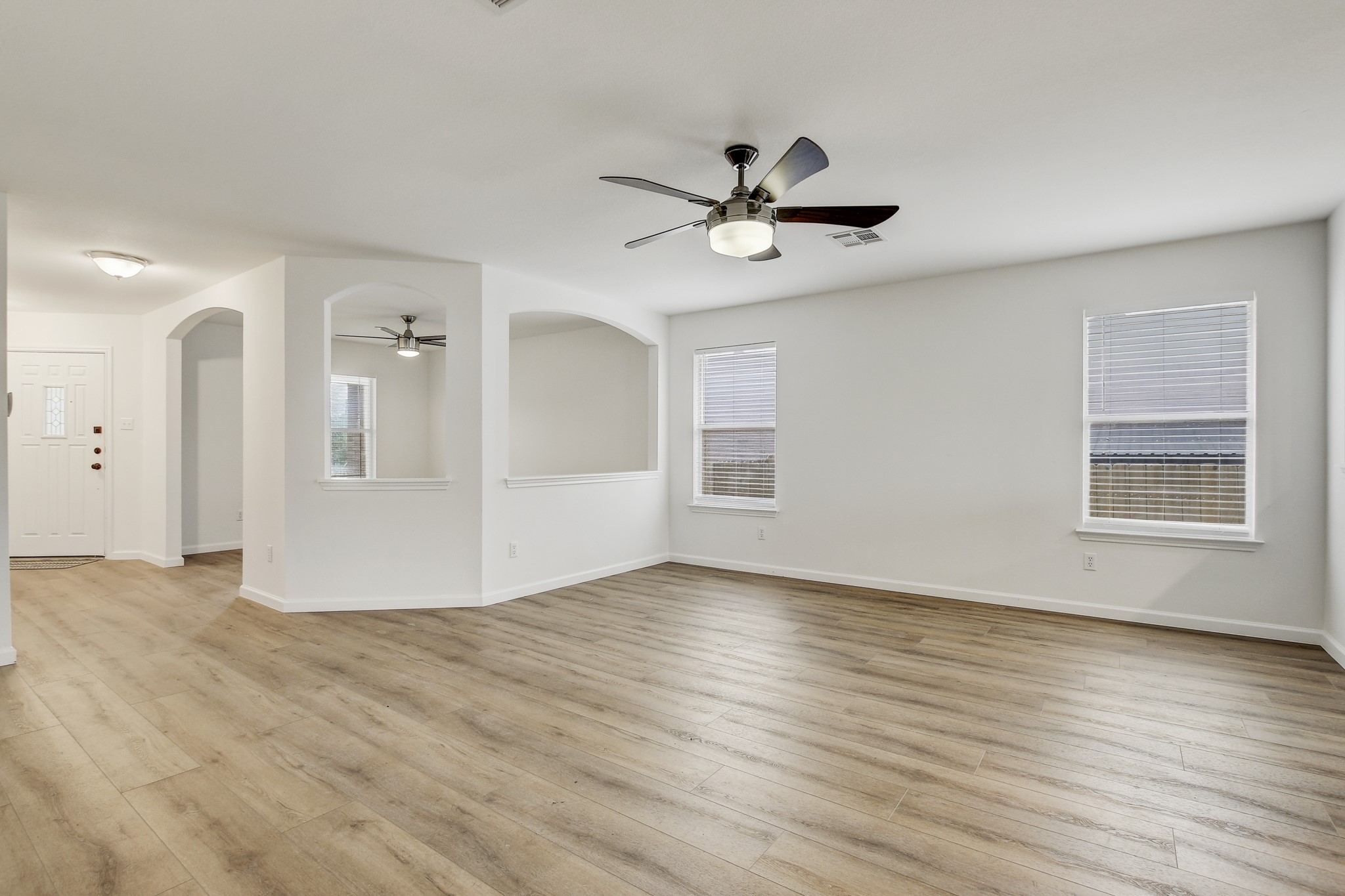 315 Northern Trail Leander, TX 78641 - Photo 6 of 30 a view of empty room with wooden floor and fan