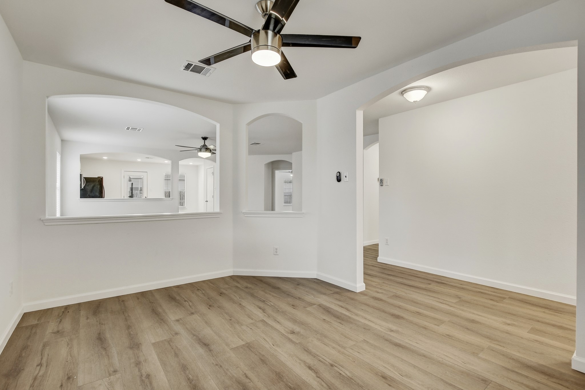 315 Northern Trail Leander, TX 78641 - Photo 9 of 30 a view of empty room with wooden floor and fan