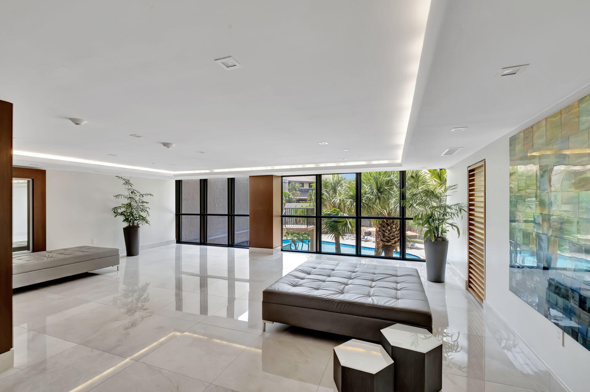 540 Brickell Key Drive, Unit 919 Miami, FL 33131 - Photo 28 of 42 a living room with furniture and large windows