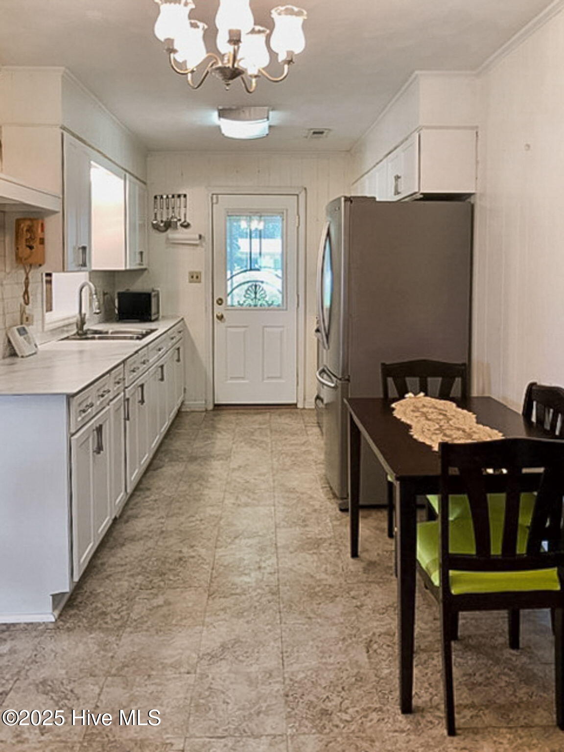 302 Jamestown Road Windsor, NC 27983 - Photo 10 of 23 Kitchen Leads to Screened-In Porch