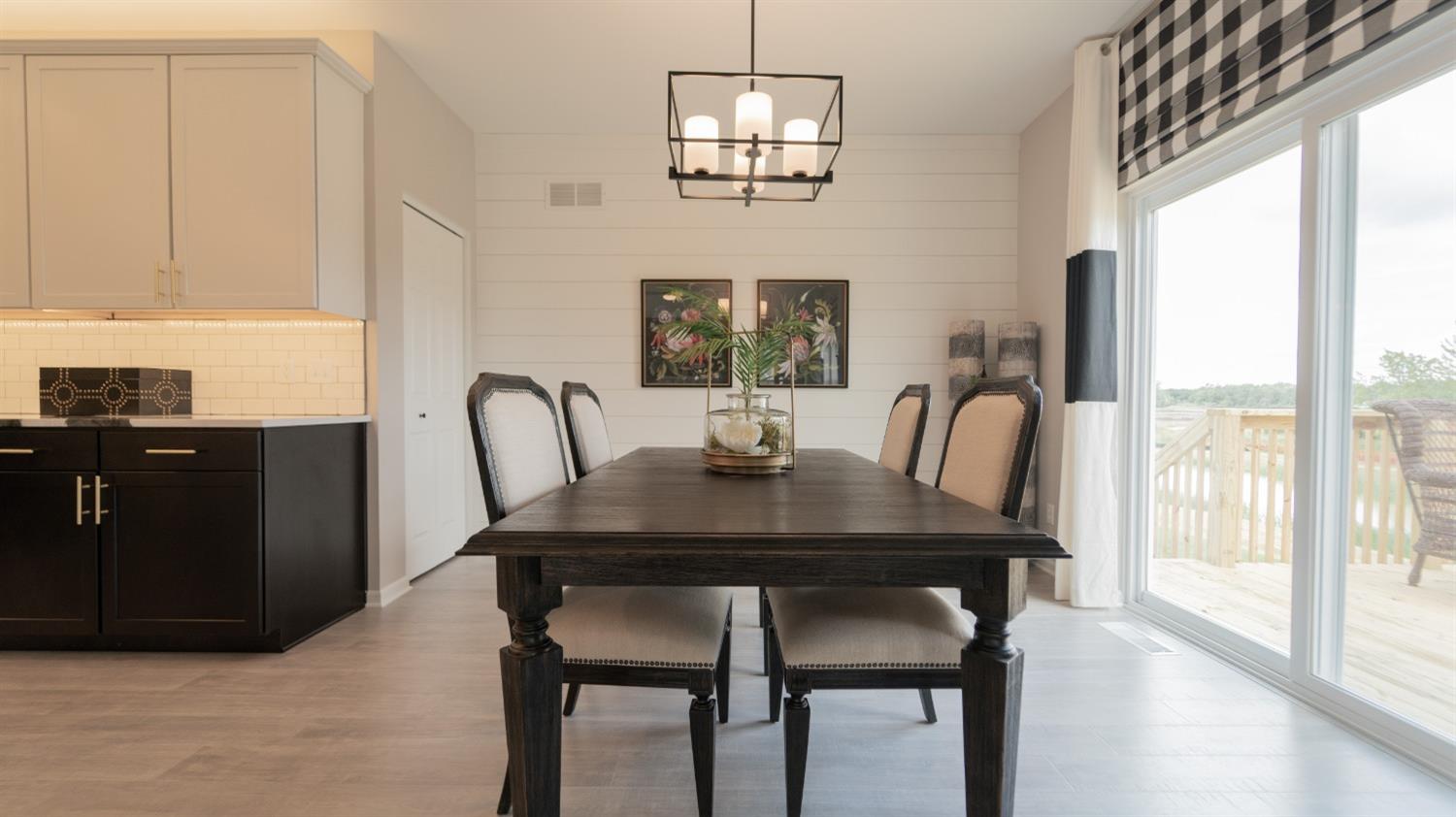 8713 Burr Rdg Circle Crown Point, IN 46307 - Photo 17 of 21 a view of a dining room with furniture and a window
