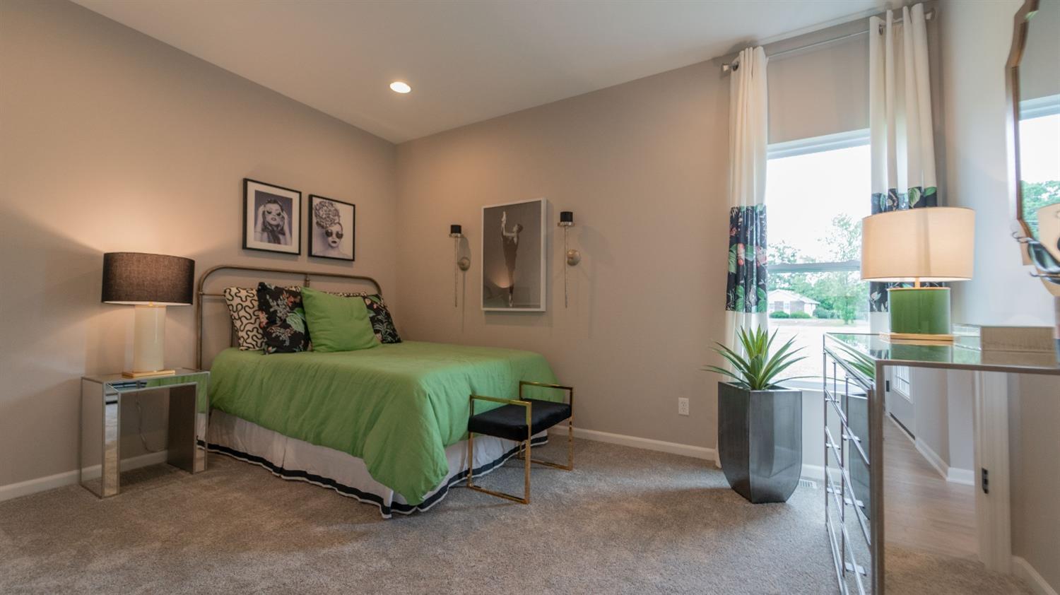 8713 Burr Rdg Circle Crown Point, IN 46307 - Photo 2 of 21 a bedroom with a bed chandelier and a window