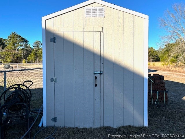 4437 Dudley Road Fayetteville, NC 28312 - Photo 33 of 41 a view of a balcony with chair