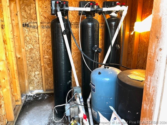 4437 Dudley Road Fayetteville, NC 28312 - Photo 34 of 41 a view of walk in closet with clothes