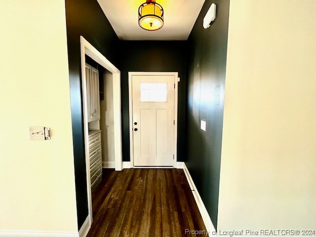 4437 Dudley Road Fayetteville, NC 28312 - Photo 4 of 41 a view of a hallway with wooden floor