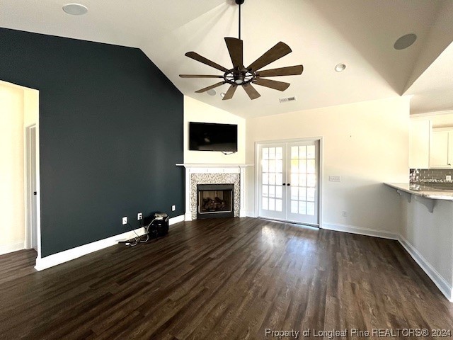 4437 Dudley Road Fayetteville, NC 28312 - Photo 5 of 41 a view of a livingroom with wooden floor and a ceiling fan