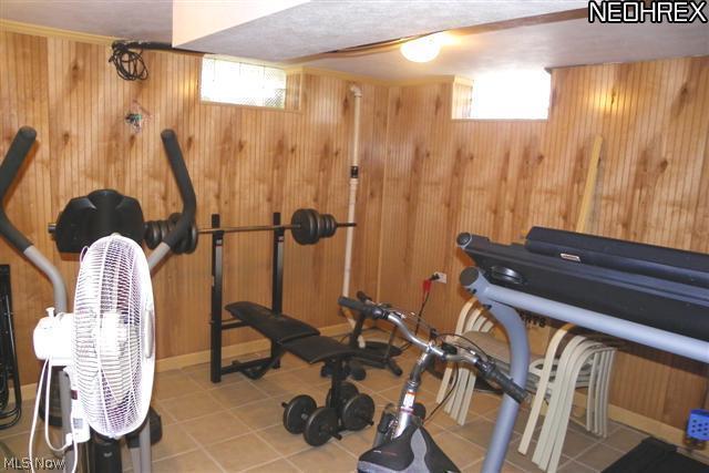 1721 Randolph Road Mogadore, OH 44260 - Photo 21 of 24 Lower level exercise room with ceramic floors