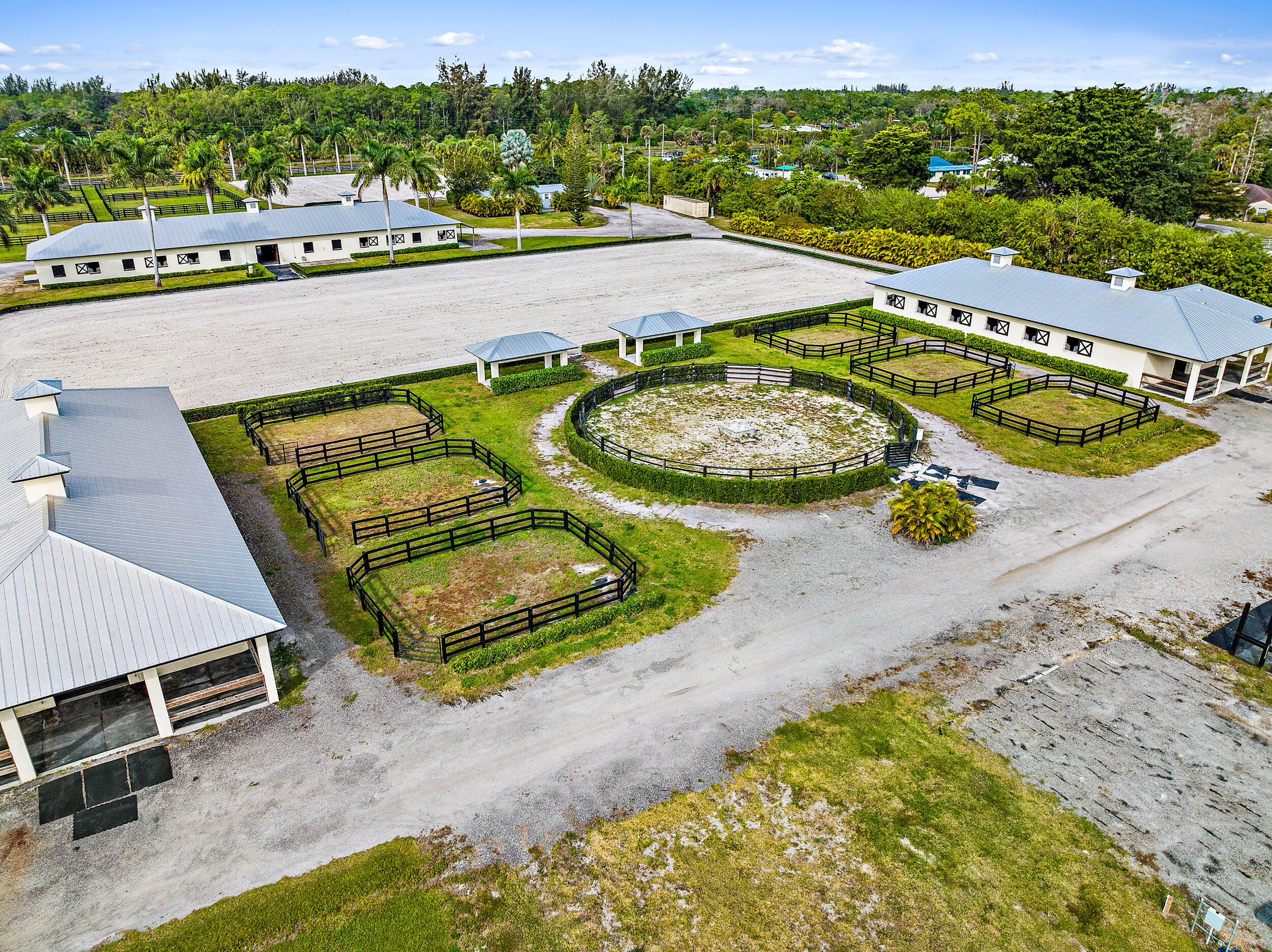 1150 F Road Loxahatchee Groves, FL 33470 - Photo 27 of 33 an aerial view of a pool patio swimming pool and outdoor seating