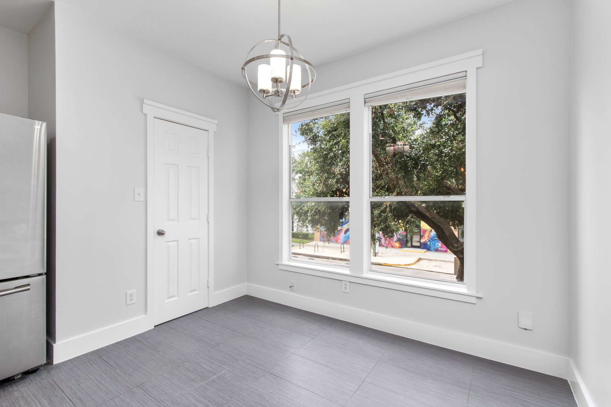 1213 Nagle Street Houston, TX 77003 - Photo 14 of 25 a view of an empty room with a window