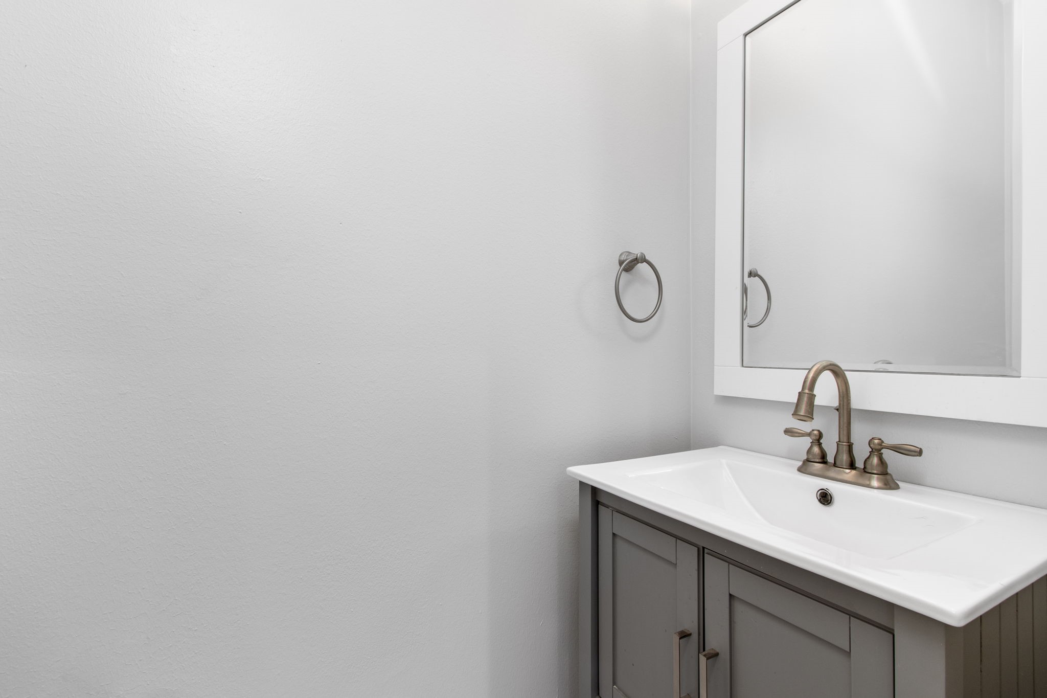 1213 Nagle Street Houston, TX 77003 - Photo 15 of 25 a bathroom with a sink and vanity