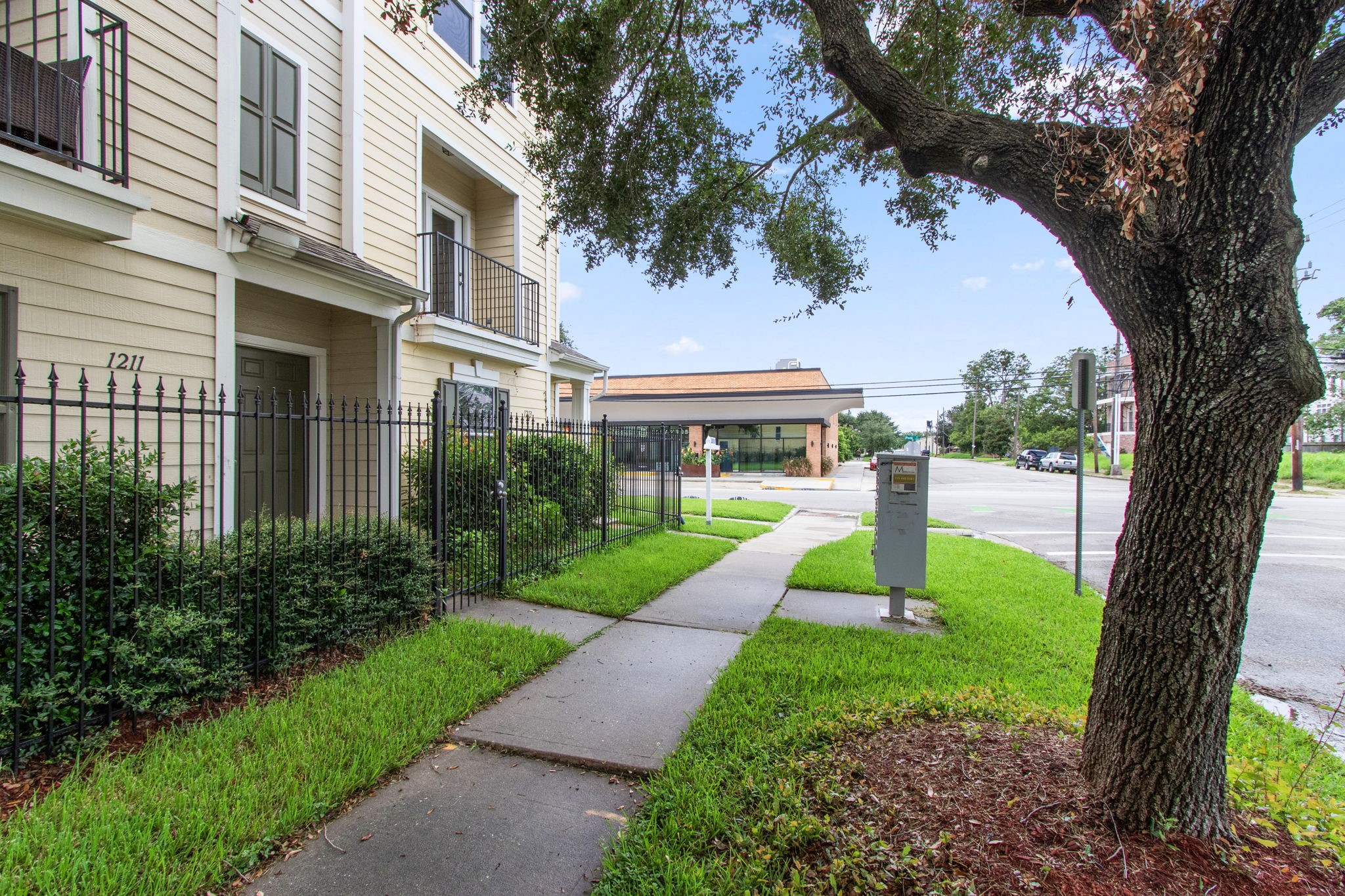 1213 Nagle Street Houston, TX 77003 - Photo 2 of 25 a front view of a house with garden