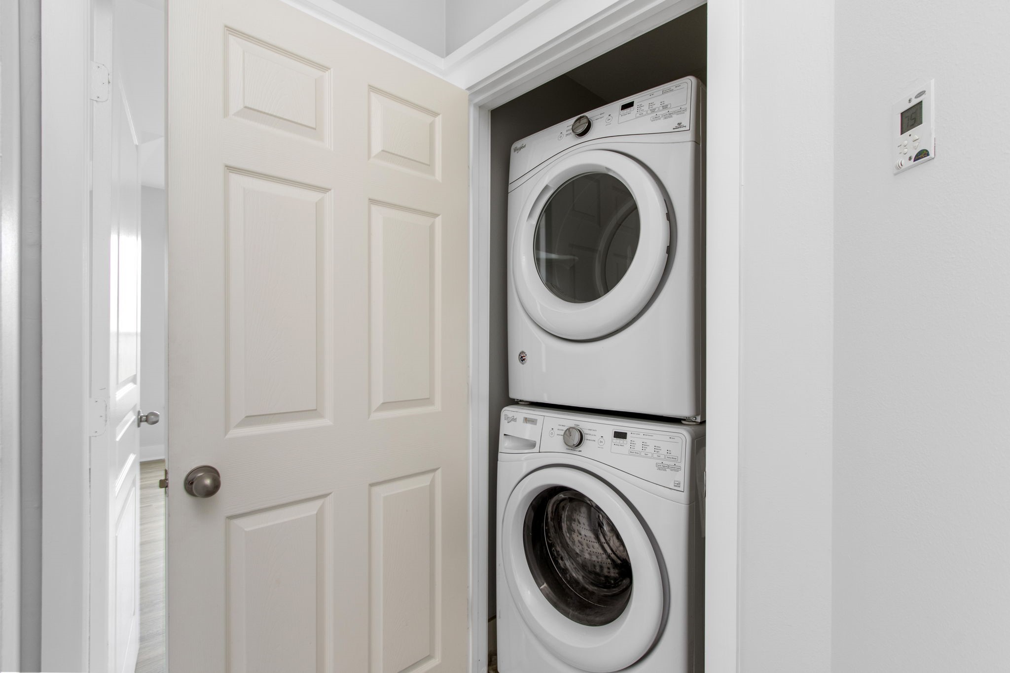 1213 Nagle Street Houston, TX 77003 - Photo 22 of 25 a view of a hallway with washer and dryer