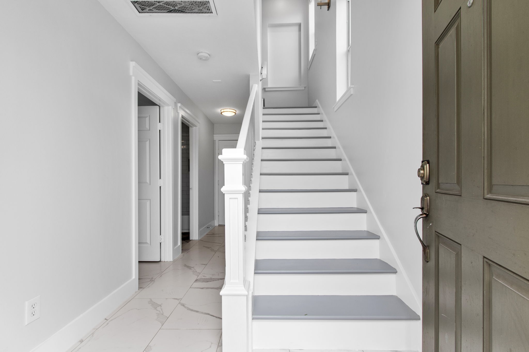 1213 Nagle Street Houston, TX 77003 - Photo 4 of 25 a view of entryway and hall with wooden floor