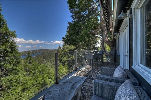 a view of balcony with furniture