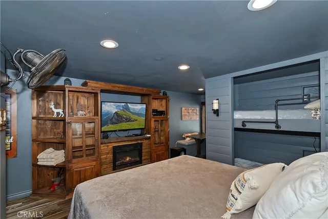 a bedroom with a bed and furniture