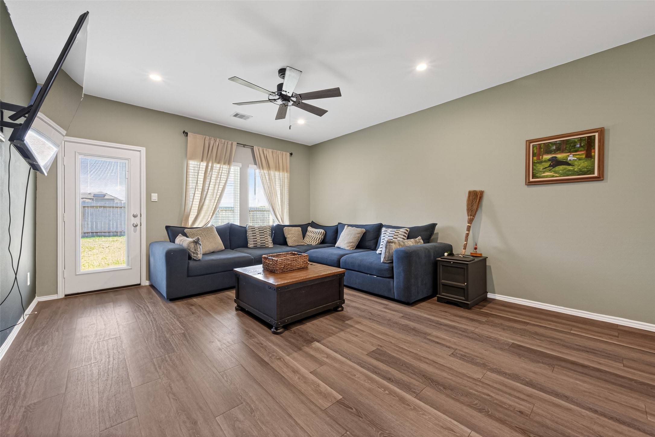 24251 Copperleaf Bay Ln Spring Spring, TX 77373 - Photo 15 of 42 a living room with furniture and a large window