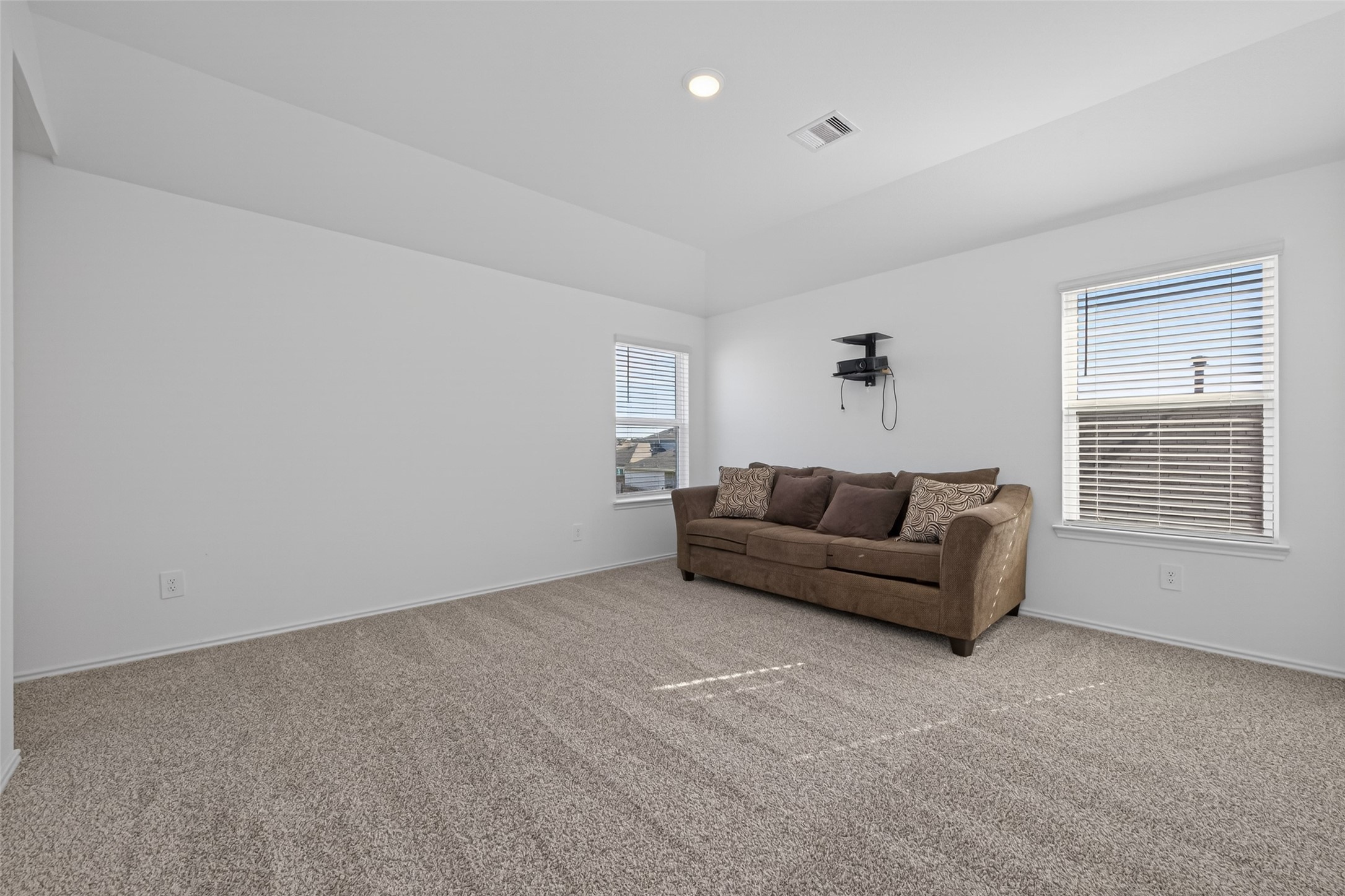 24251 Copperleaf Bay Ln Spring Spring, TX 77373 - Photo 27 of 42 a living room with furniture and a window