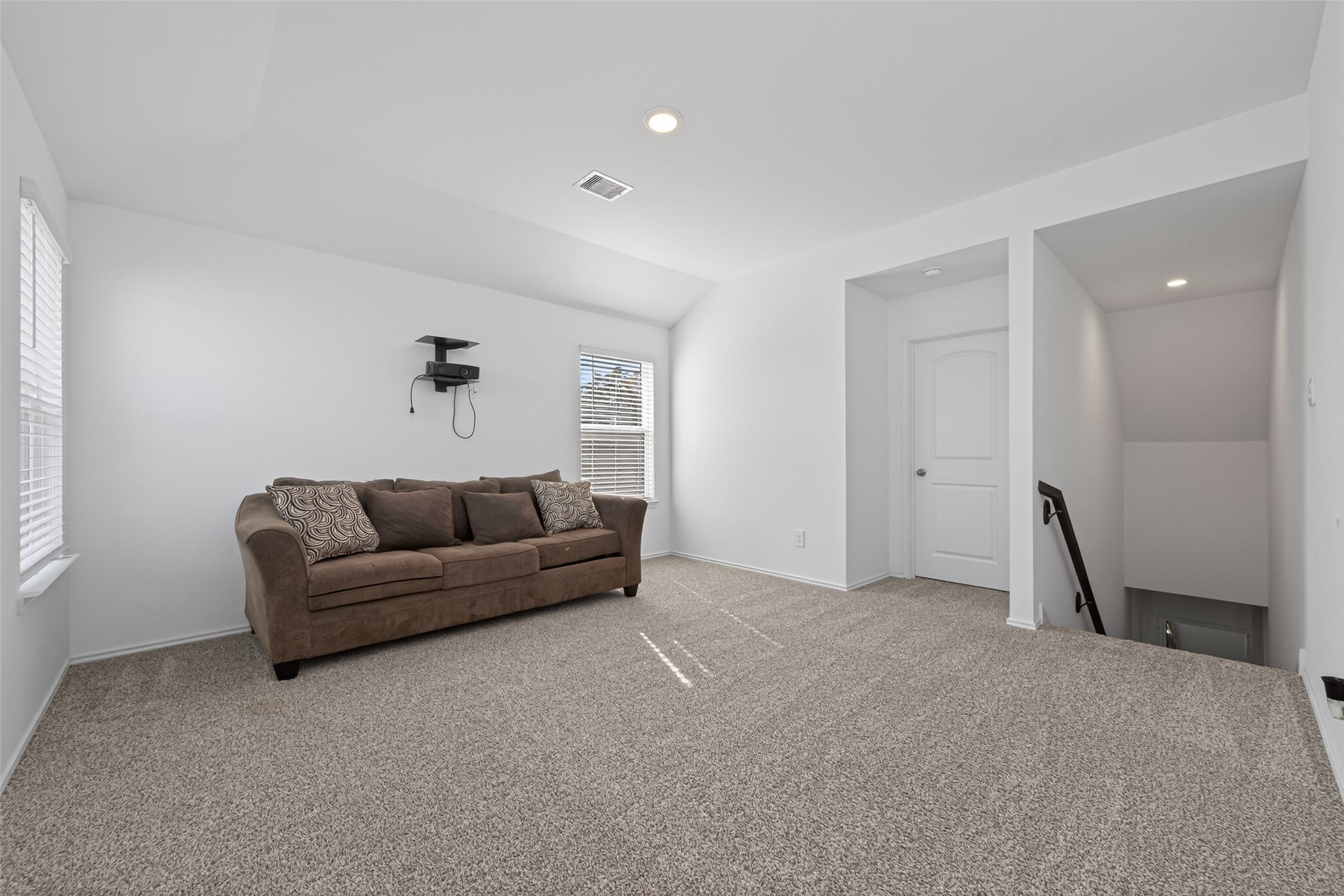 24251 Copperleaf Bay Ln Spring Spring, TX 77373 - Photo 30 of 42 a living room with furniture and a rug