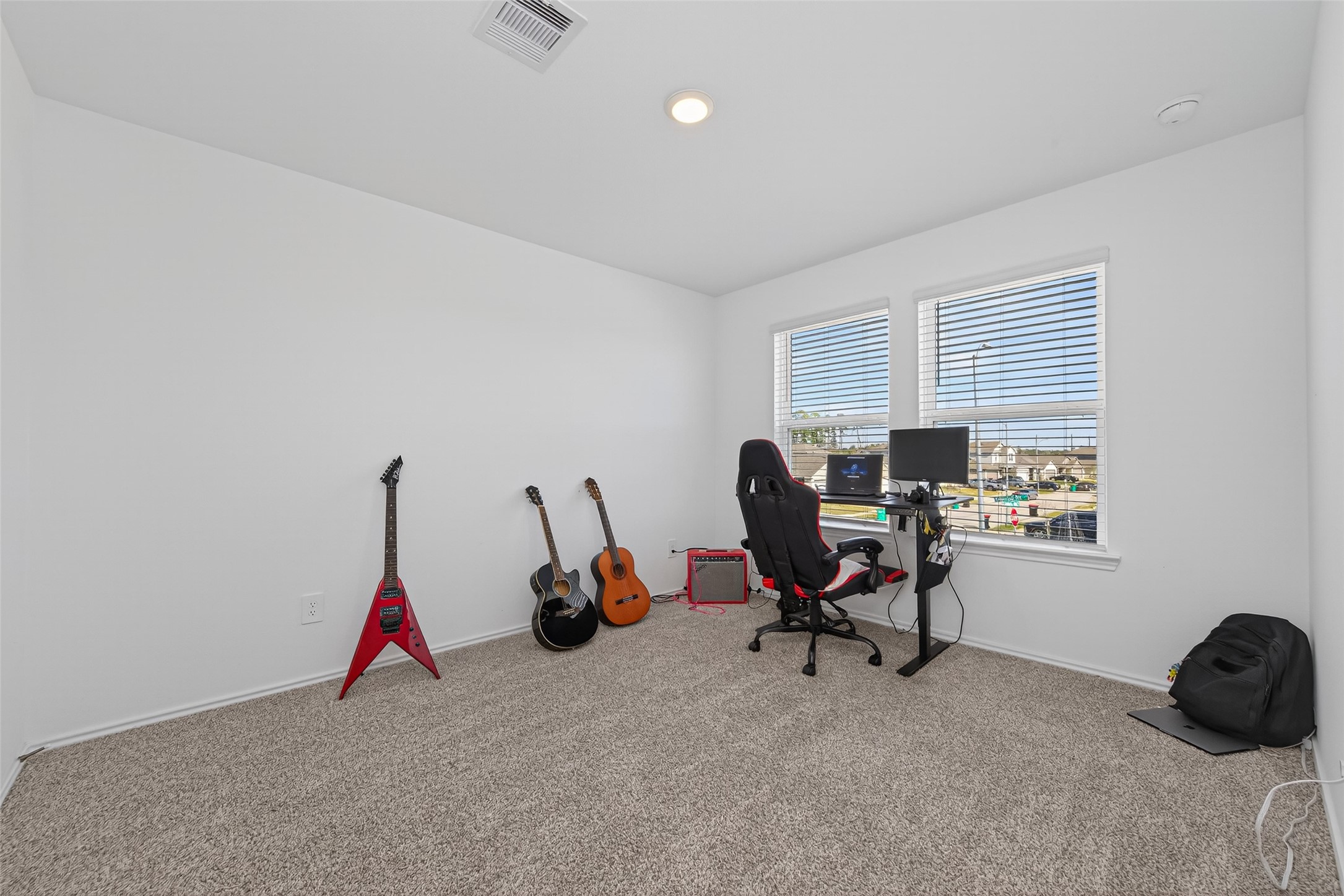 24251 Copperleaf Bay Ln Spring Spring, TX 77373 - Photo 31 of 42 a view of a workspace with furniture and a window