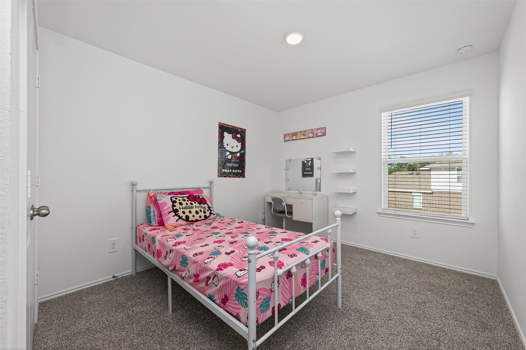 24251 Copperleaf Bay Ln Spring Spring, TX 77373 - Photo 34 of 42 a bedroom with a bed lamp and a window